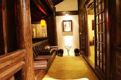 фото отеля Lijiang Yunjin Yaju Courtyard Hotel