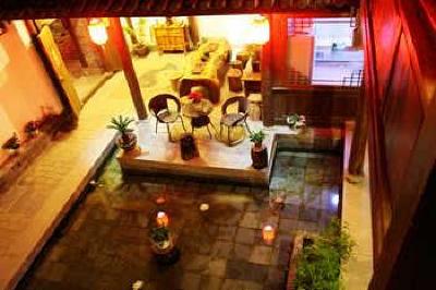 фото отеля Lijiang Yunjin Yaju Courtyard Hotel