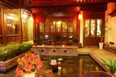 фото отеля Lijiang Yunjin Yaju Courtyard Hotel