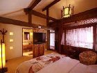 фото отеля Lijiang Yunjin Yaju Courtyard Hotel