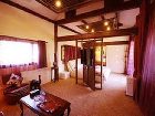 фото отеля Lijiang Yunjin Yaju Courtyard Hotel