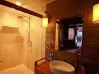 фото отеля Lijiang Yunjin Yaju Courtyard Hotel