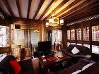 фото отеля Lijiang Yunjin Yaju Courtyard Hotel