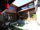 фото отеля Lijiang Yunjin Yaju Courtyard Hotel