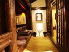 фото отеля Lijiang Yunjin Yaju Courtyard Hotel