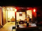 фото отеля Lijiang Yunjin Yaju Courtyard Hotel