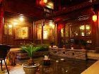 фото отеля Lijiang Yunjin Yaju Courtyard Hotel