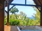 фото отеля Tainos Cottages