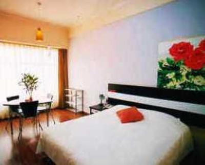 фото отеля Aizunke Qingdao Fu Zhou Road