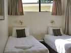 фото отеля Pohara Beachfront Motel