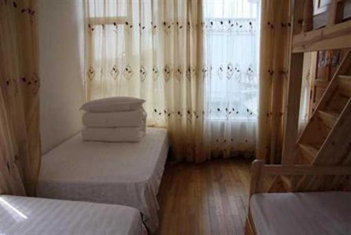 фото отеля Mama's Naxi Guest House Dali