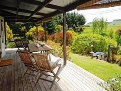 фото отеля Big Tom's Cottages