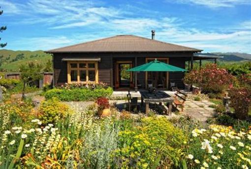 фото отеля Big Tom's Cottages