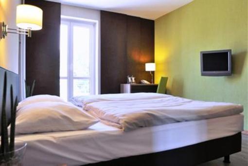 фото отеля Hotel Am Park Garching bei Munchen