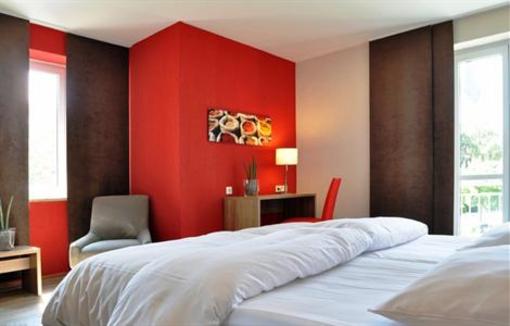 фото отеля Hotel Am Park Garching bei Munchen
