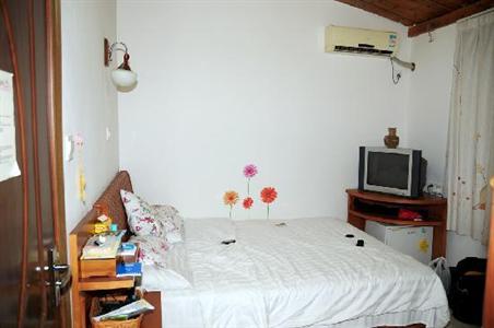 фото отеля Sunny Sanya Family Inn