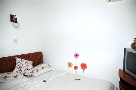 фото отеля Sunny Sanya Family Inn
