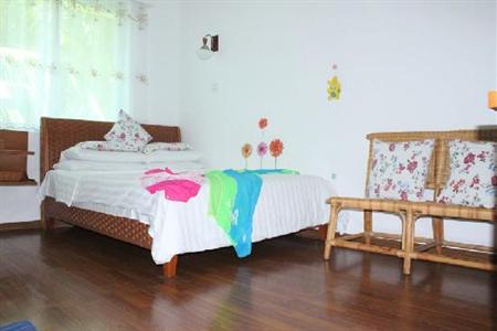 фото отеля Sunny Sanya Family Inn