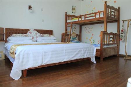 фото отеля Sunny Sanya Family Inn