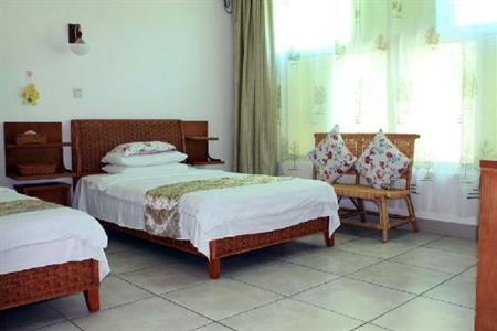 фото отеля Sunny Sanya Family Inn