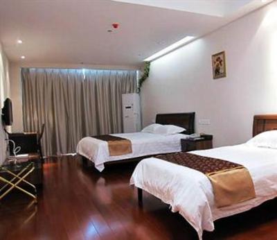 фото отеля Suzhou Ding Warm Apartment Hotel