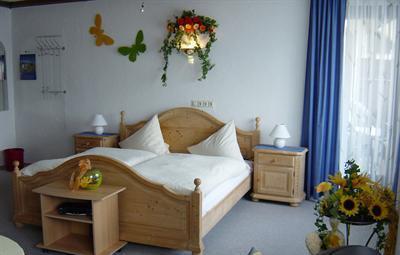 фото отеля Pension und Cafe Am Forst