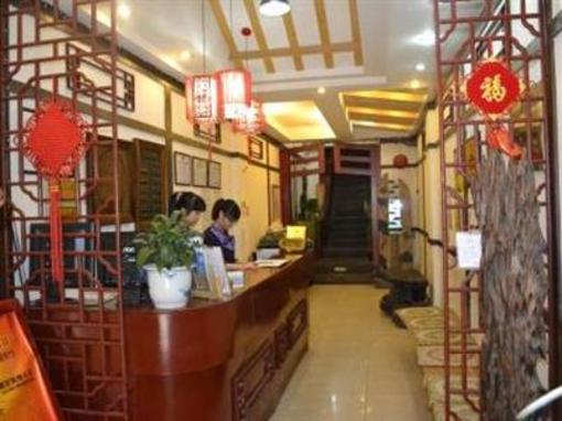 фото отеля Chengdu Zhengfu Caotang Dexin Inn