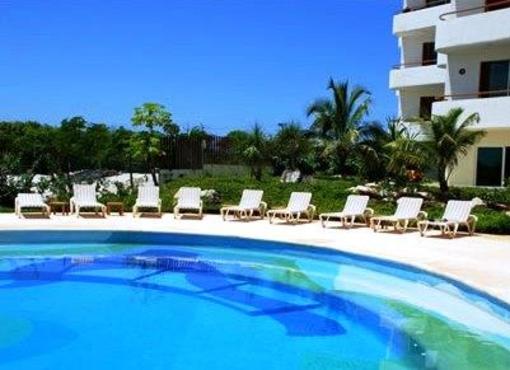 фото отеля Puerta Al Mar Condominiums Isla Mujeres