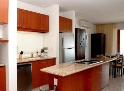 фото отеля Puerta Al Mar Condominiums Isla Mujeres
