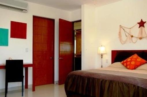 фото отеля Puerta Al Mar Condominiums Isla Mujeres