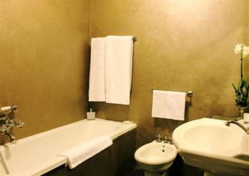 фото отеля The Place Suite della Spiga Milan