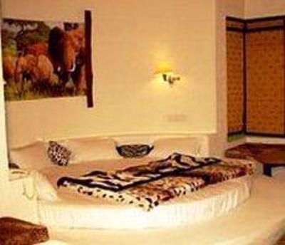 фото отеля Tiger Woods Kanha Resort & Spa