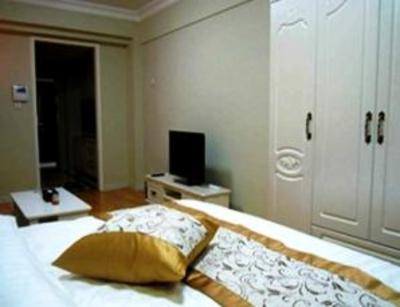 фото отеля Dalian Mingrui Zuoan Classic Fashion Apartment