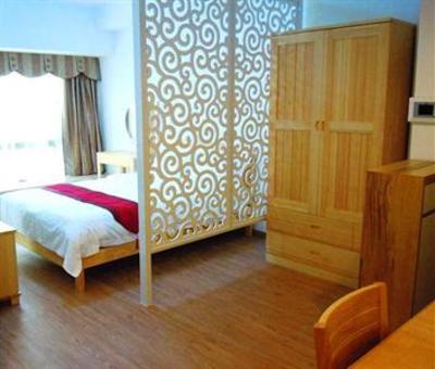 фото отеля Shidanni Jiuding International Apartment