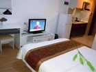фото отеля Shidanni Jiuding International Apartment