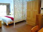 фото отеля Shidanni Jiuding International Apartment