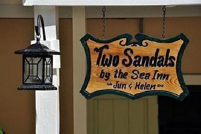 фото отеля Two Sandals By The Sea Inn