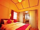 фото отеля Lijiang Mengzhiju Hotel
