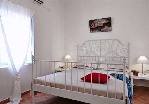 фото отеля Oia Suites