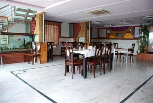 фото отеля Hotel Dew Drops Bangalore