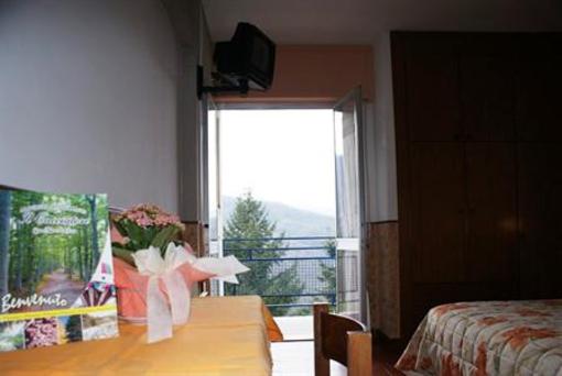 фото отеля Albergo Il Cacciatore
