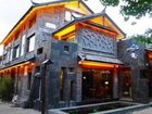 фото отеля Lijiang Share Year Boutique Hotel