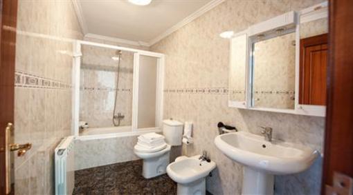 фото отеля Aparthotel Playa De Quenxe