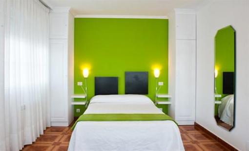 фото отеля Aparthotel Playa De Quenxe