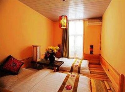 фото отеля Tangjiage Hostel
