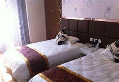 фото отеля Super 8 Hangzhou Huanglong Yuquan Xiaoqu