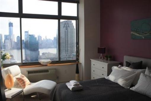 фото отеля Dharma Home Suites JC at Grove Station