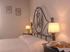 фото отеля L'Aia Country Holidays Bed & Breakfast Monteriggioni