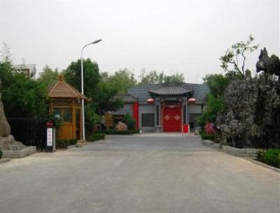 фото отеля Taohua Zhuangyuan Hotel