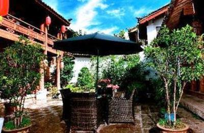 фото отеля Lijiang Riverside Inn